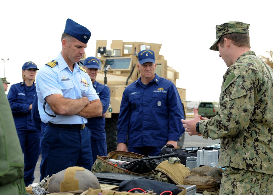 US Coast Guard liaison officers during a visit to Navy Expeditionary Combat Command 131115-N-MD211-082