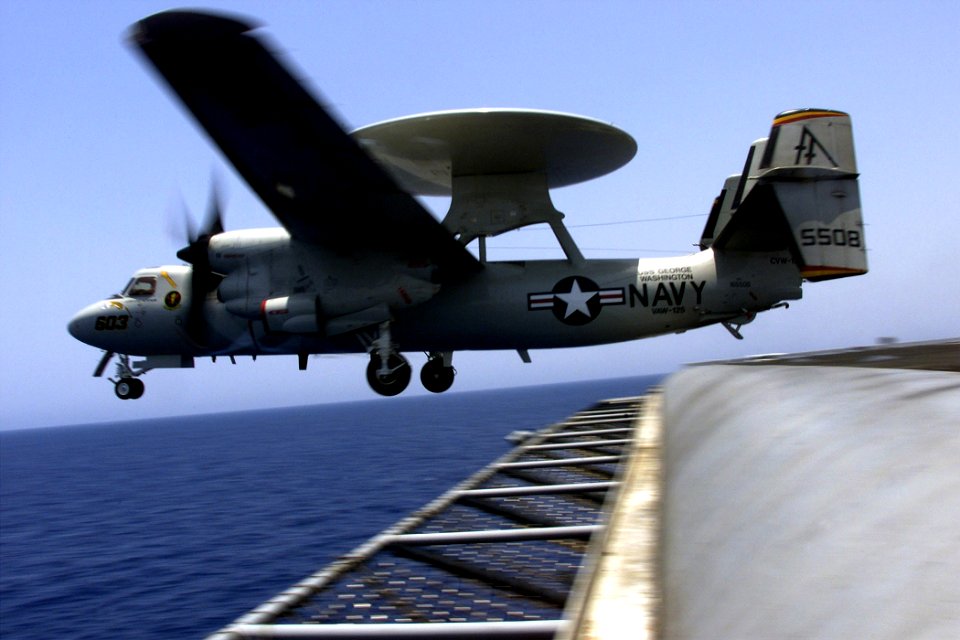 US Navy 000719-N-ZC101-501 An E-2C Hawkeye, from VAW 125 lifts off from the flight deck of the USS George Washington