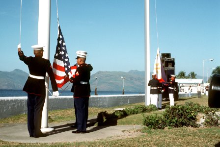 US Flag lowered and Philippine flag raised during turnover of NS Subic Bay photo