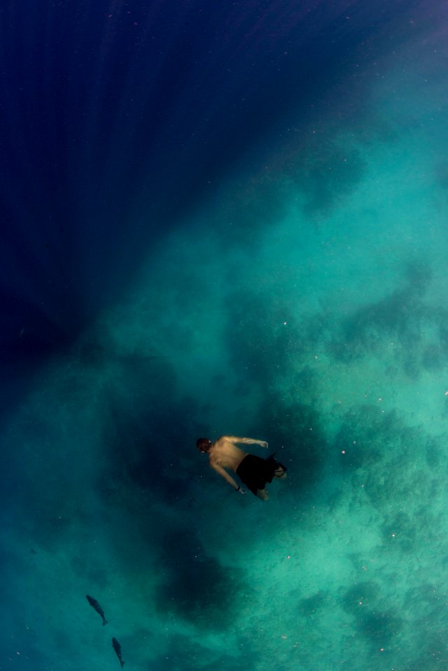 US EOD techs and Belizean Coast Guard divers work together during Southern Partnership Station '14. 140711-N-IP743-140