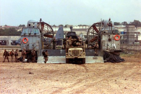 US Marines and their equipment loaded on board the LCAC is sitting alongside the runway at the airport of Mogadishu photo