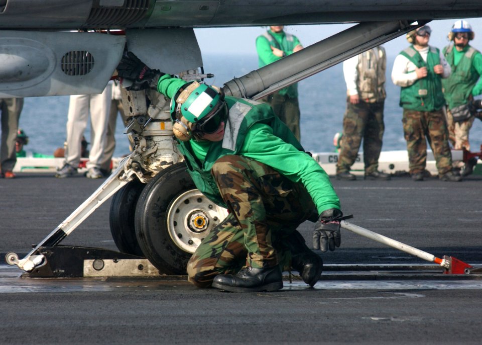 US Navy 020130-N-1407C-001 Sailor prepares aircraft for launch