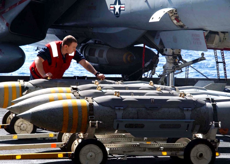 US Navy 020302-N-6492H-501 Staging bombs on elevator aboard ship