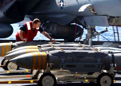 US Navy 020302-N-6492H-501 Staging bombs on elevator aboard ship