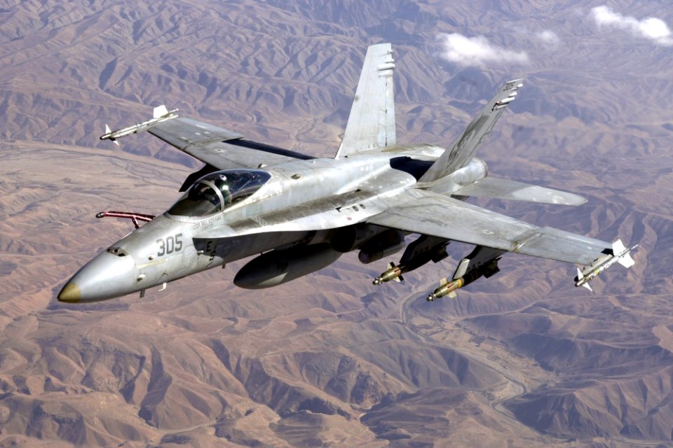 US Navy 011026-F-4884R-006 U.S. Navy F-A-18 prepares for aerial refueling