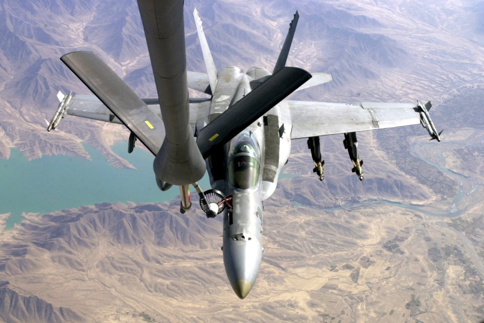 US Navy 011026-F-4884R-004 U.S. Navy F-A-18 refuels during Operation Enduring Freedom