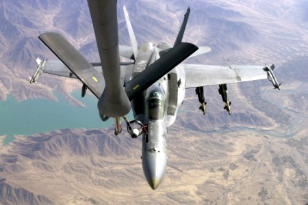 US Navy 011026-F-4884R-004 U.S. Navy F-A-18 refuels during Operation Enduring Freedom photo