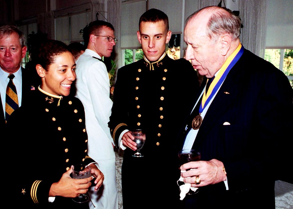 US Navy 010921-N-5390M-002 File Photo, Former Chairman of the Joint Chiefs of Staff Adm. William J. Crowe Jr., talks with Midshipmen at a reception honoring the U.S. Naval Academy Alumni Association Distinguished Graduate Award