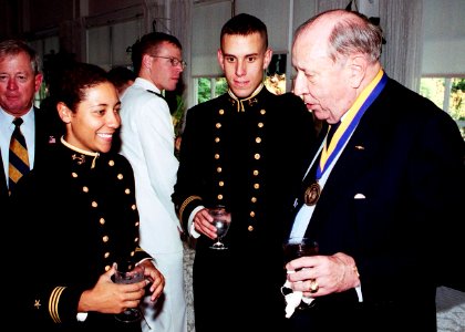 US Navy 010921-N-5390M-002 File Photo, Former Chairman of the Joint Chiefs of Staff Adm. William J. Crowe Jr., talks with Midshipmen at a reception honoring the U.S. Naval Academy Alumni Association Distinguished Graduate Award