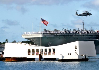 US Navy 020801-N-3228G-001 USS Abraham Lincoln (CVN 72) passes the Arizona Memorial in Pearl Harbor, Hawaii