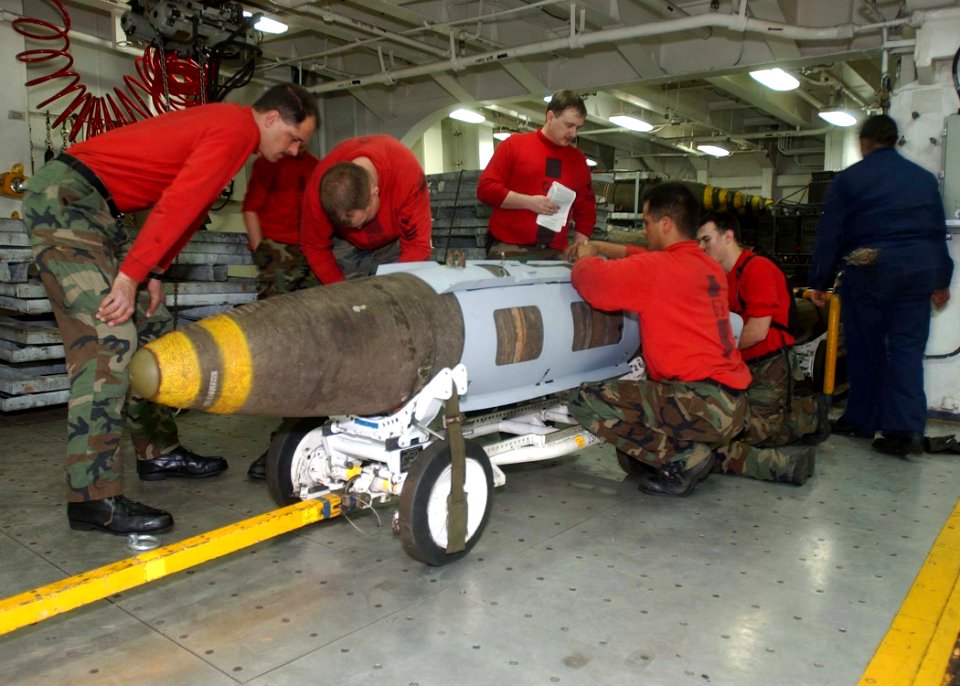 US Navy 020302-N-6492H-515 Preparing JDAM weapons in the ship's magazine
