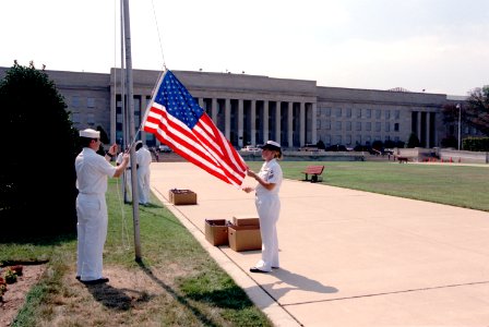 US Navy 020815-D-2987S-185 Raising Pentagon flags for future use at military installations photo