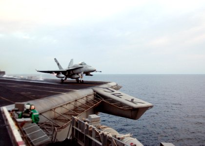 US Navy 020319-N-6492H-514 F-A-18 launches from USS John F. Kennedy photo