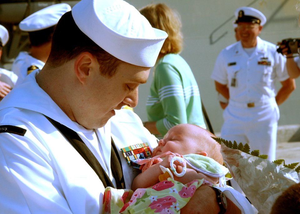 US Navy 020416-N-4374S-501 Sailor meets daughter for the first time
