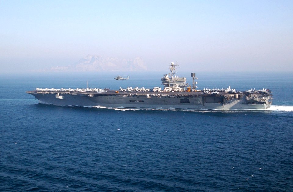 US Navy 020808-N-6492H-502 USS John F. Kennedy passing the Rock of Gibraltar