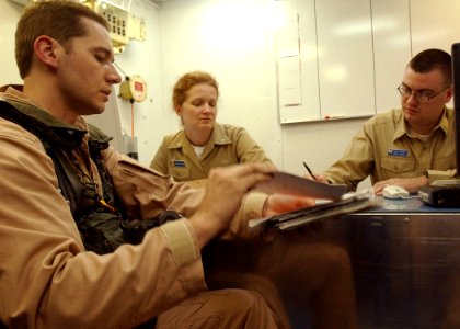 US Navy 020424-N-6492H-550 USS Kennedy - debriefing