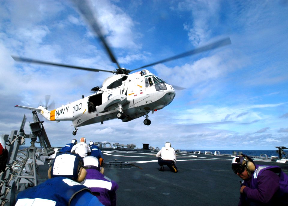 US Navy 021025-N-8629M-001 SH-3 lands aboard USS Milius