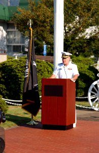 US Navy 020920-N-5592W-003 Commander, Fleet Activities Sasebo, delivers message at Fleet Activities Sasebo Japan
