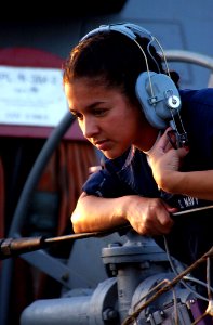 US Navy 020708-N-5471P-072 Sailor aboard USS Hopper provides communications with small boats alongside