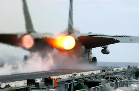 US Navy 021109-N-1810F-017 After burners on an F-14 Tomcat fire as the aircraft makes a cataputl launch