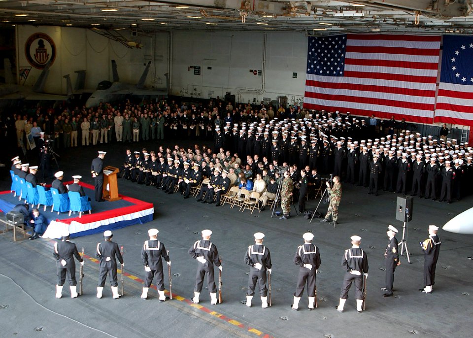 US Navy 021109-N-6433N-001 Sailors aboard the Washington attend a memorial service held in the ship's hangar bay for Lieutenant Commander Robert Clukey III