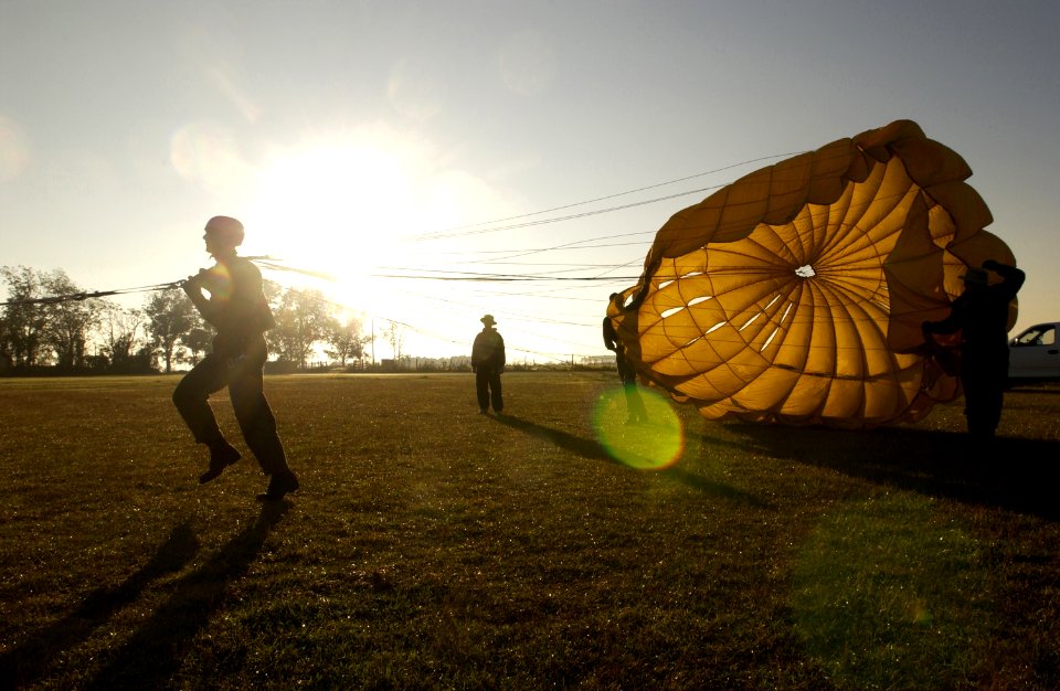 US Navy 021106-N-5862D-001 Navy, Air Force, and Marine Corps officers get a taste of the dynamics of parachuting by training with a parasail