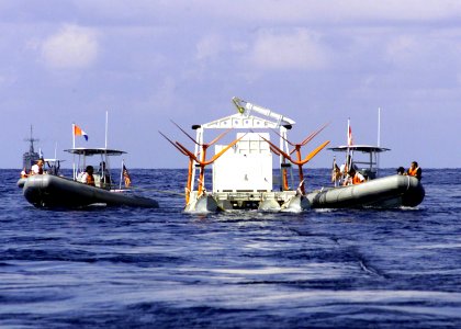 US Navy 021021-N-2972R-567 Sailors assigned to the Blackhawks of Helicopter Mine Countermeasures Squadron One Five (HM-15), provide towing support to a MK-105 Magnetic Influence Minesweeping System (Hydrofoil)