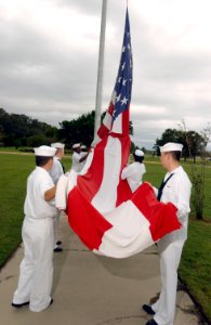 US Navy 021111-N-5862D-001 Sailors prepare to raise the national ensign photo