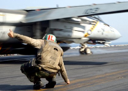 US Navy 020902-N-3986D-001 Final checks of an F-14