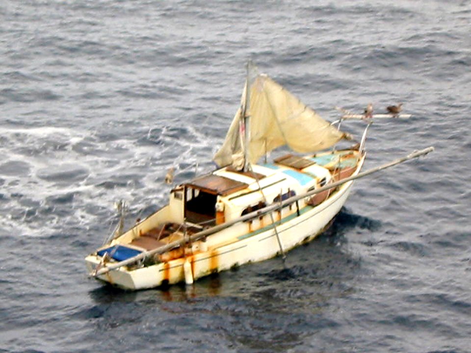 US Navy 020917-N-0000X-028 Sailboat adrift at sea after U.S. Navy rescue