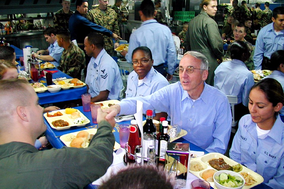 US Navy 021024-N-1131G-005 Secretary of the Navy, Gordon England shares lunch with Sailors and Marines aboard the amphibious assault ship during a visit off the coast of California