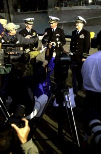 US Navy 021102-N-4142G-039 Rear Adm. Barry Costello (center) Battle Group Commander, Capt. John W. Miller (left) Commanding Officer USS Constellation (CV 64), and Capt. Mark Fox, Carrier Air Wing Commander Two, take questions