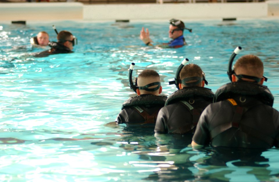 US Navy 021104-N-5862D-016 Students at the Aviation Rescue Swimmer School spend countless hours in the pool learning techniques to recover downed flight crew and personnel who have fallen overboard at sea