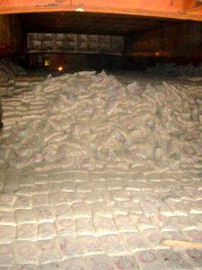 US Navy 021209-O-0000X-010 Containers found to have scud missile parts in the cargo hold aboard the North Korean vessel, So San, discovered after being boarded by Spanish Special Forces