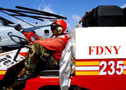 US Navy 021107-N-4374S-035 Crash and salvage team member stands watch during flight operations