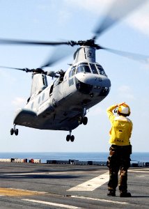 US Navy 021107-N-4374S-037 CH-46 retuns aboard ship photo