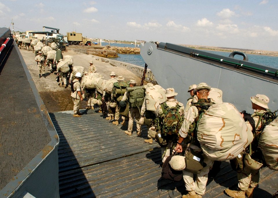 US Navy 021110-N-4374S-035 U.S. Marines assigned to the 24th Marine Expeditionary Unit (MEU) Special Operations Capable (SOC) disembark from a Landing Craft Utility (LCU) 1662 assigned to Assault Craft Unit Two (ACU-2)