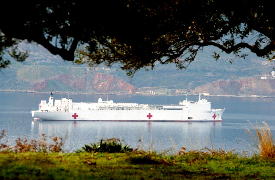 US Navy 030122-N-0780F-002 USNS Comfort (T-AH 20) enters the harbor near Naval Station Souda Bay, Crete, Greece, during her transit of the eastern Mediterranean