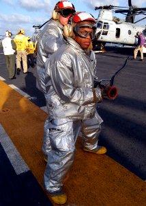 US Navy 030211-N-4048T-036 Sailors assigned to the Crash and Salvage Team conduct a flight deck fire drill