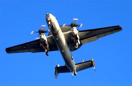 US Navy 021207-N-1810F-014 E-2C Hawkeye flies directly over the flight deck
