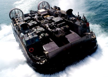 US Navy 030215-N-4048T-081 LCAC leaves USS Kearsarge loaded equipment