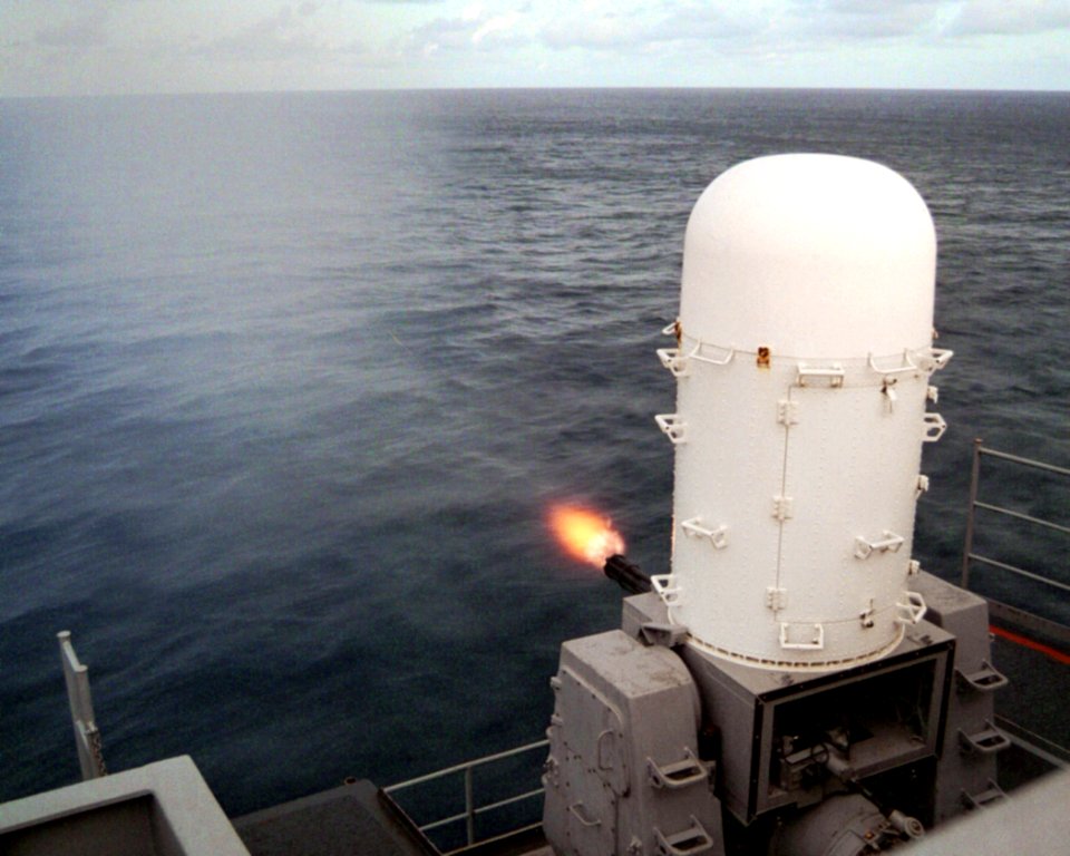 US Navy 030114-N-5786V-002 Phalanx MK-15 Close In Weapons Systems (CIWS) fires a high-speed computer controlled, radar guided, 20 mm Gatling gun