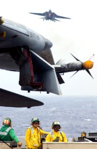 US Navy 021031-N-1810F-012 An F-14 Tomcat assigned to the Black Knights of Fighter Squadron One Fifty Four (VF-154) prepares to make an arrested gear landing on the ship's flight deck