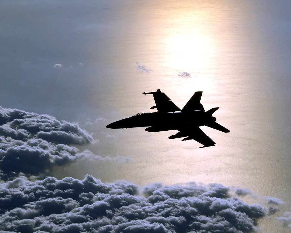 US Navy 030301-F-3408B-006 An F-A-18 Hornet from Strike Fighter Squadron One Five (VFA-15) patrol the skies over the eastern Mediterranean