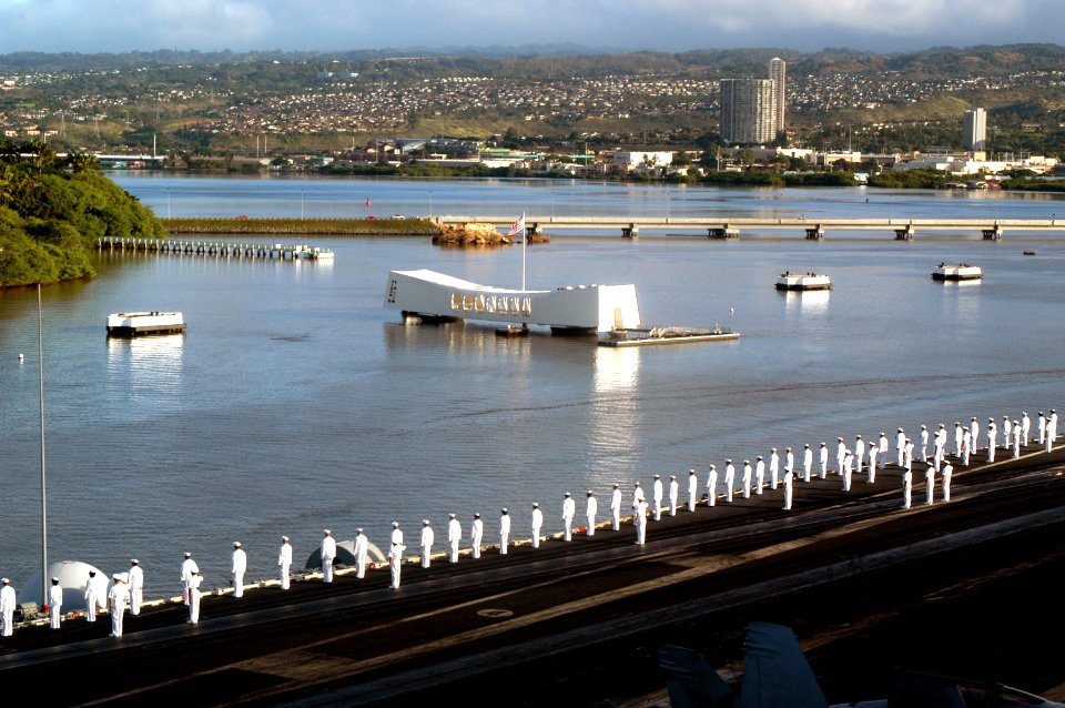 US Navy 030131-N-9273C-016 Sailors render honors to the Arizona Memorial as the aircraft carrier USS Carl Vinson (CVN 70) passes by to moor at Naval Station Pearl Harbor, Hawaii
