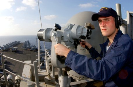 US Navy 030222-N-1810F-002 Seaman Jeffery Rich from Asheboro, N.C., stands watch on the signal bridge during a no-fly day