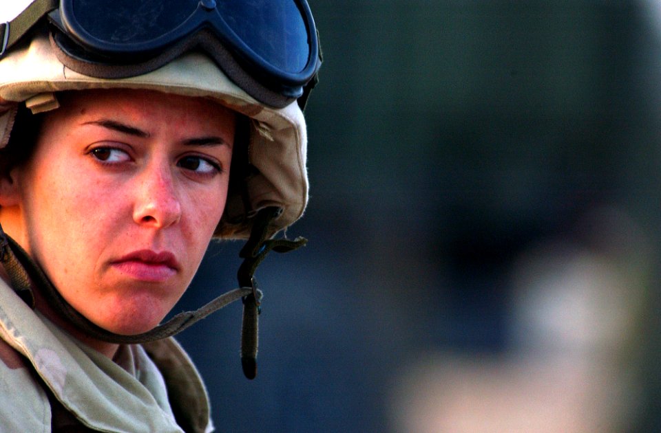 US Navy 030208-N-5319A-003 Construction Mechanic 3rd Class Morgan Cameron assigned to Naval Mobile Construction Battalion Seventy-Four (NMCB-74) listens to instructions while she attends vehicle inspection training