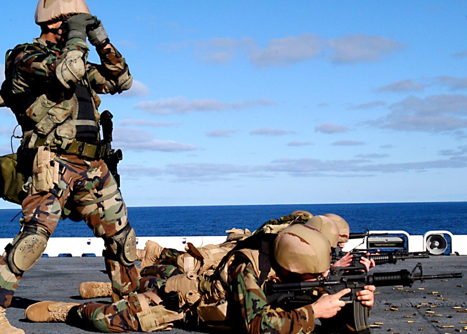 US Navy 030124-N-4048T-077 Personnel assigned to Explosive Ordnance Disposal (EOD) Mobile Unit Six (EODMU-6) Detachment One Two