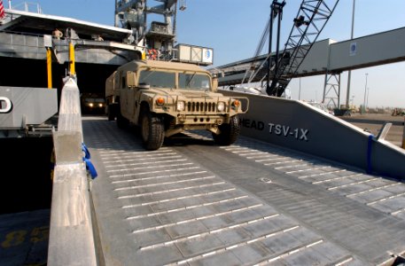 US Navy 030126-N-5319A-008 United States Army Vessel (USAV) Theater Support Vessel-1X (TSV-1X) offloads a High Mobility Multipurpose Wheeled Vehicle