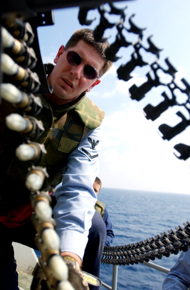 US Navy 030307-N-6141B-003 Fire Controlman 3rd Class Steven Goad from Virginia Beach, Va., loads 20mm ammunition into a Phalanx Mk-15 Close In Weapons System (CIWS) aboard USS Theodore Roosevelt (CVN 71)